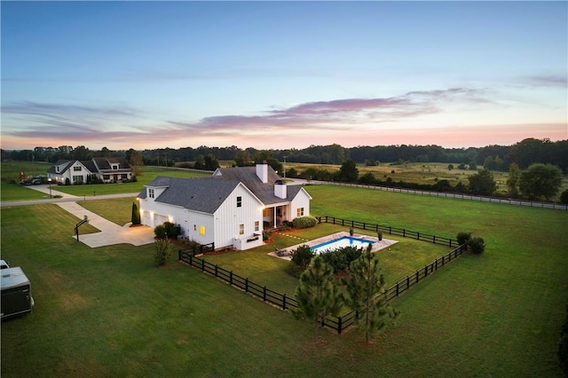 aerial view at dusk with a rural view