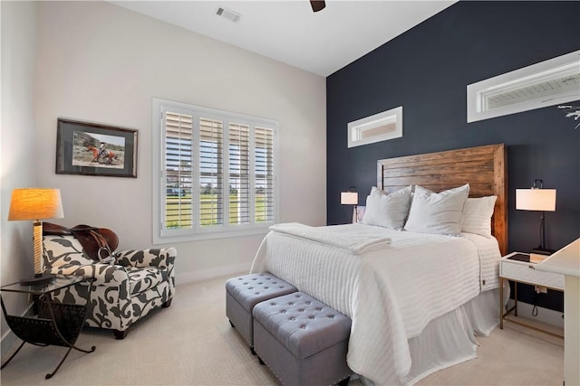 carpeted bedroom with ceiling fan