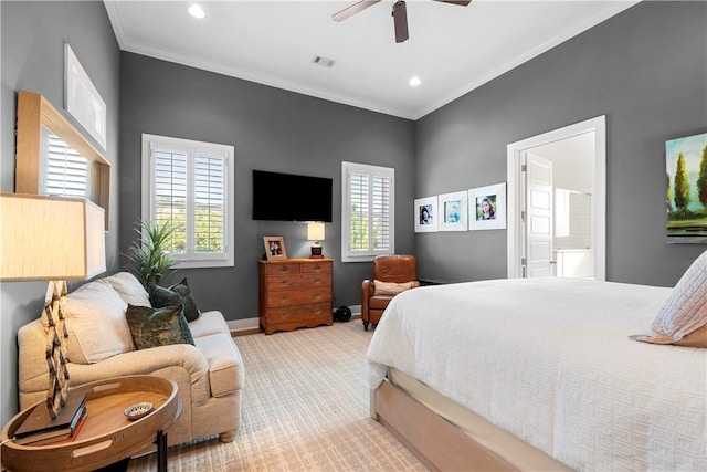 bedroom with connected bathroom, ceiling fan, and crown molding