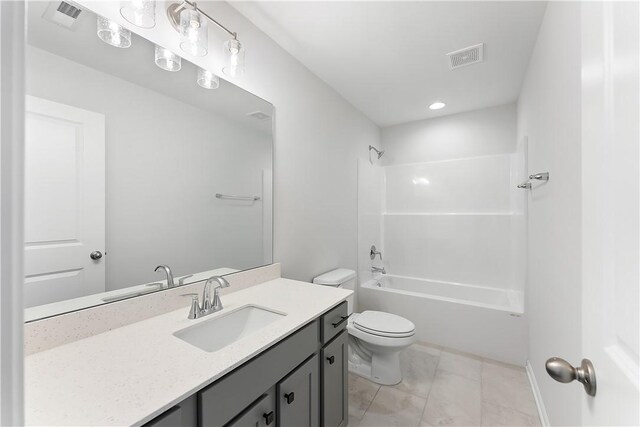 full bathroom with vanity, toilet, tile patterned flooring, and shower / bathing tub combination