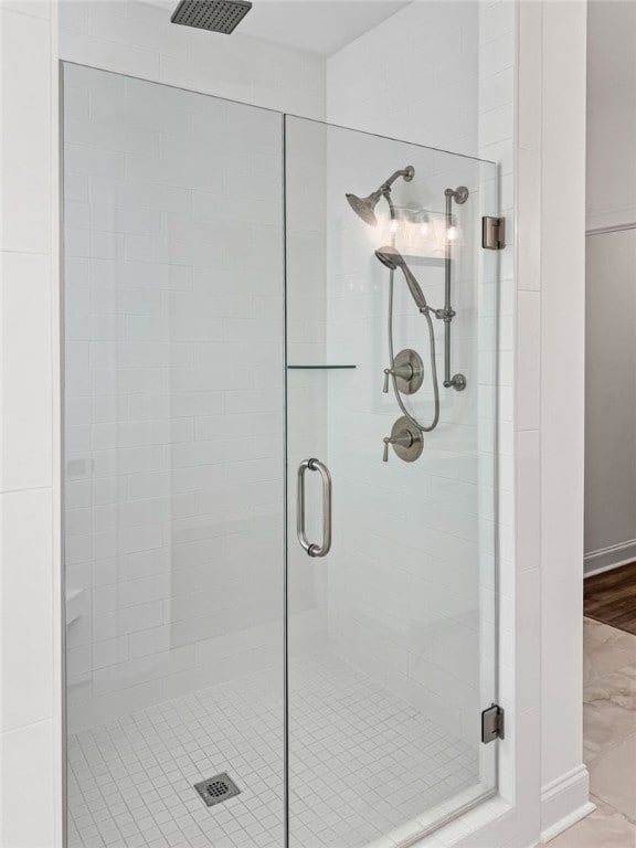 bathroom featuring walk in shower