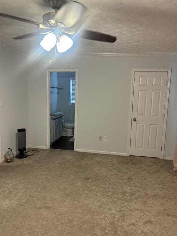 522 Oak Meadow Ln, Auburn, AL 36830 - spare room with a ceiling fan, carpet floors, ornamental molding, baseboards, and a textured ceiling