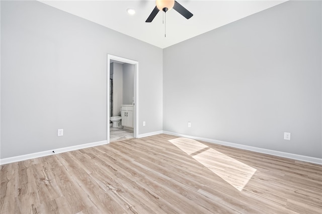 spare room with ceiling fan and light hardwood / wood-style floors