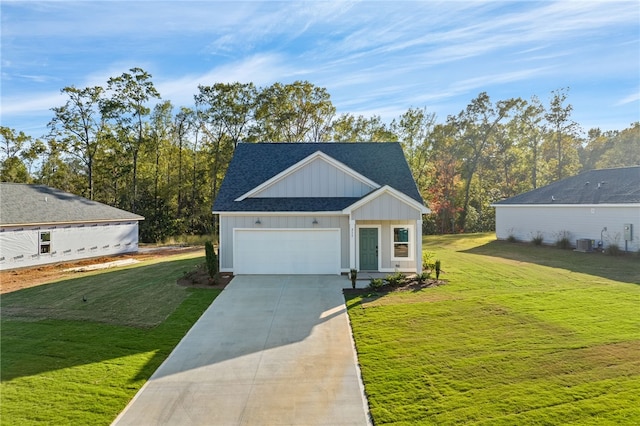 view of front of home with a garage, a front lawn, and cooling unit