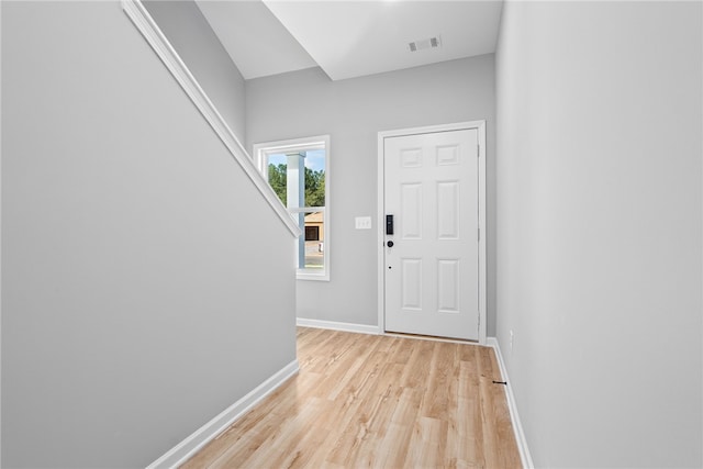 doorway with light hardwood / wood-style floors