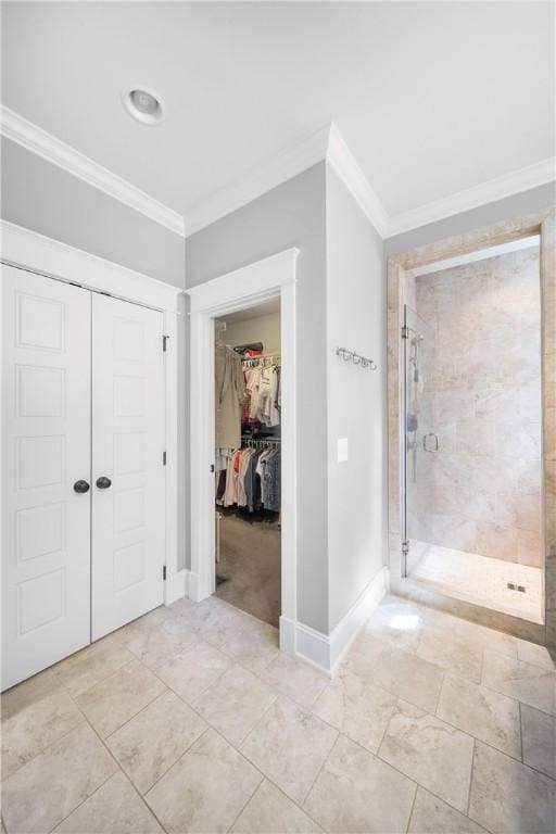3102 Quail Run, Opelika, AL 36801 - bathroom featuring crown molding, a shower stall, and a walk in closet