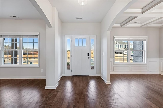 foyer with beam ceiling, dark hardwood / wood-style flooring, and coffered ceiling