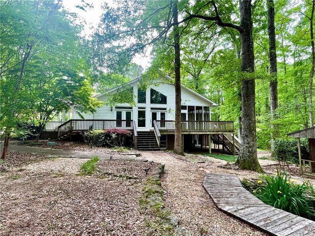 335 Forsythia Ct, Auburn, AL 36830 - rear view of house with stairs, a deck, french doors, and a sunroom