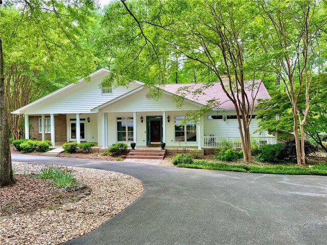 335 Forsythia Ct, Auburn, AL 36830 - view of front of home with a porch and driveway