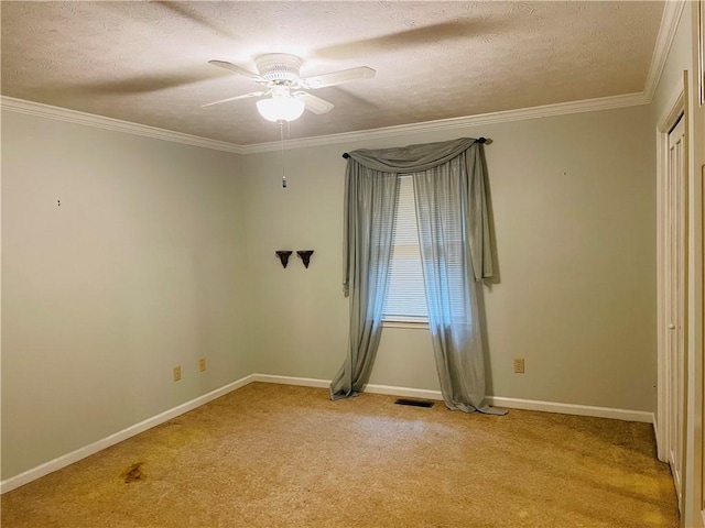 335 Forsythia Ct, Auburn, AL 36830 - spare room featuring a ceiling fan, a textured ceiling, light colored carpet, and crown molding