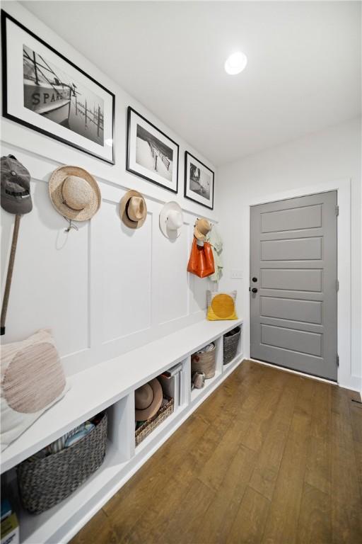 mudroom with dark wood-type flooring