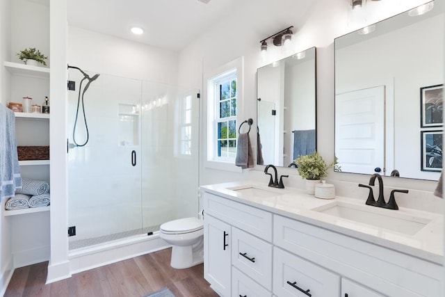108 Hunters Way, Opelika, AL 36801 - bathroom featuring a stall shower, double vanity, wood finished floors, and recessed lighting