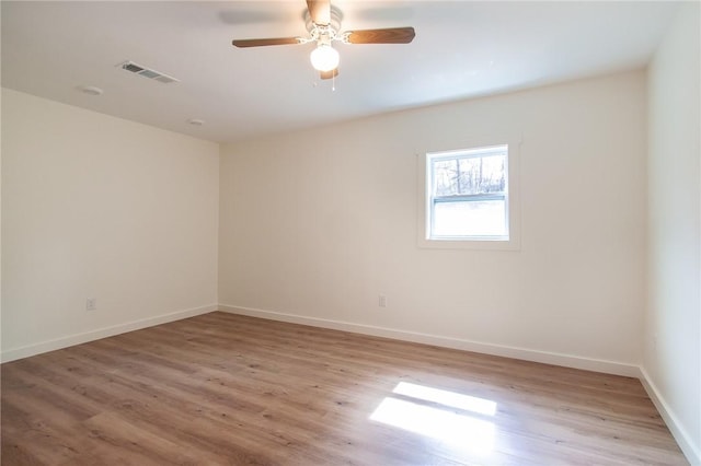 762 Lee Road 197, Phenix City, AL 36870 - empty room with visible vents, light wood-style flooring, baseboards, and ceiling fan