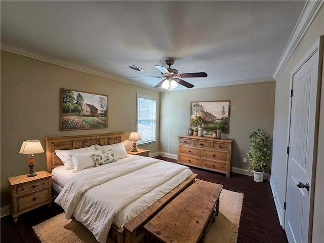 bedroom with visible vents, crown molding, and baseboards