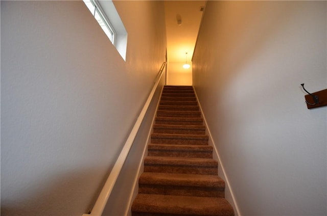 stairway with baseboards