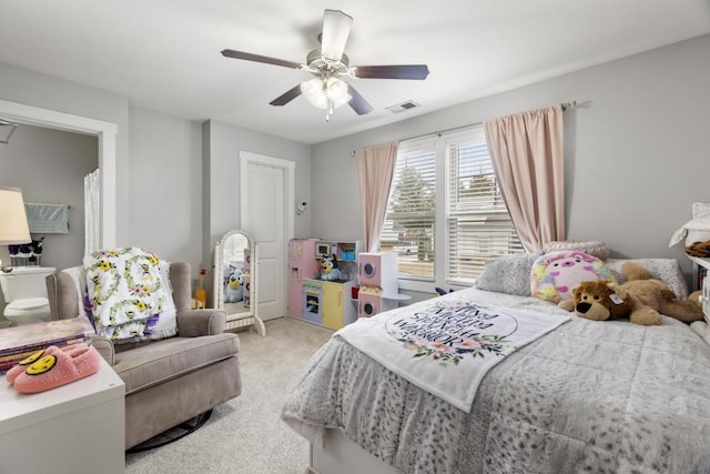 carpeted bedroom featuring ceiling fan