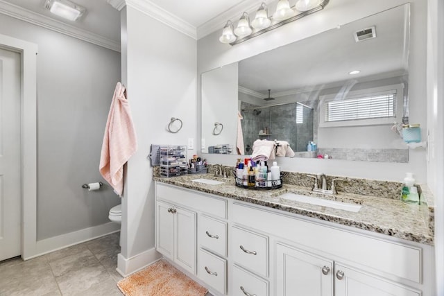 bathroom featuring vanity, ornamental molding, a shower with shower door, tile patterned floors, and toilet