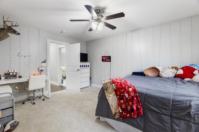 bedroom featuring ceiling fan and light colored carpet