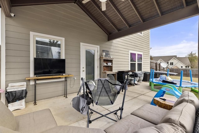 view of patio with outdoor lounge area and a trampoline