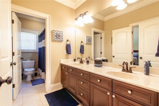 bathroom with tile patterned flooring, vanity, toilet, and crown molding