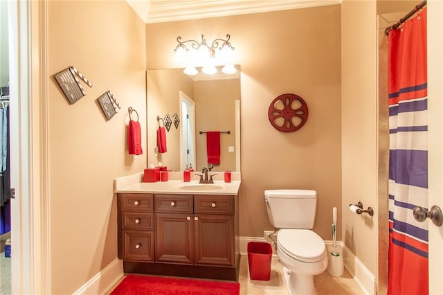 bathroom with tile patterned flooring, vanity, ornamental molding, and toilet