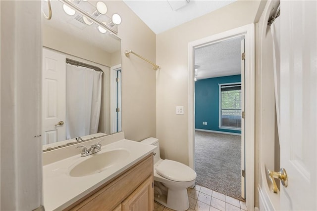 3519 Anderson Rd, Opelika, AL 36801 - full bath featuring vanity, tile patterned floors, a textured ceiling, and a shower with curtain