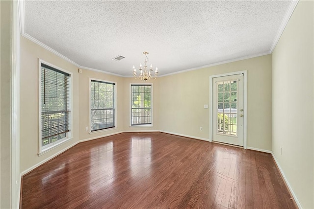3519 Anderson Rd, Opelika, AL 36801 - unfurnished room featuring wood finished floors, a chandelier, a textured ceiling, and crown molding