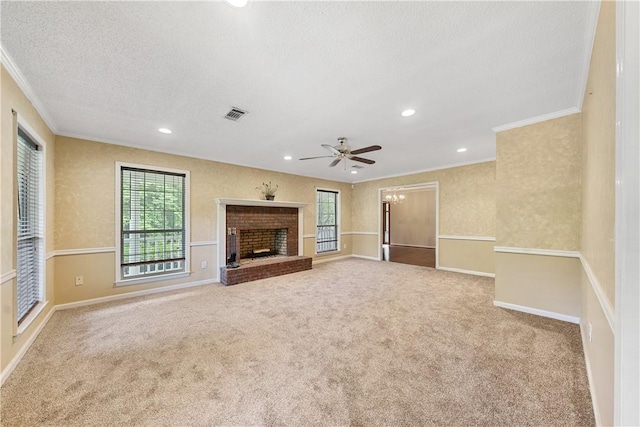 3519 Anderson Rd, Opelika, AL 36801 - unfurnished living room featuring crown molding, a ceiling fan, carpet flooring, healthy amount of natural light, and recessed lighting