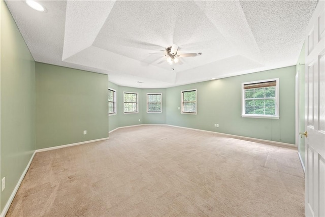 3519 Anderson Rd, Opelika, AL 36801 - carpeted spare room with a tray ceiling, ceiling fan, and a textured ceiling