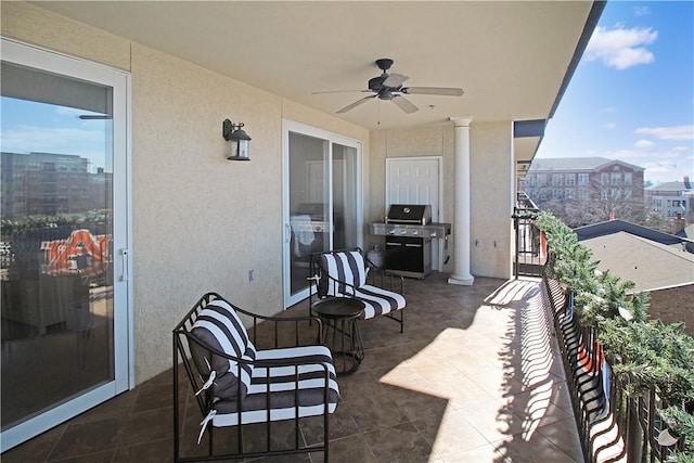 view of patio with ceiling fan, a balcony, and grilling area