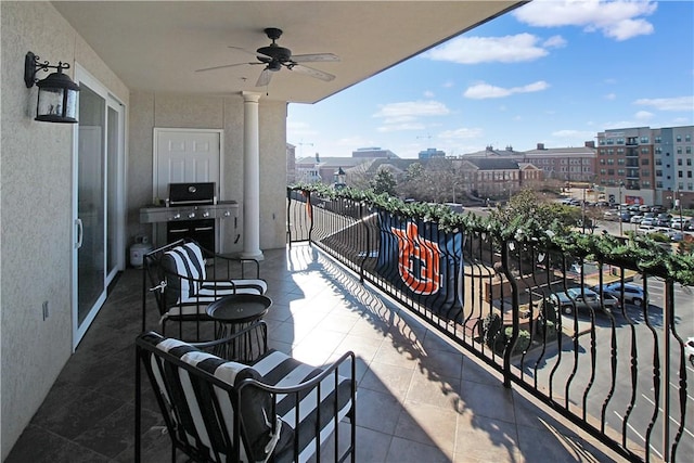 balcony featuring ceiling fan