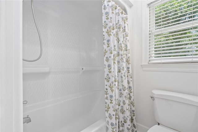 1421 Crossing Way, Auburn, AL 36830 - bathroom featuring healthy amount of natural light and shower / tub combo with curtain
