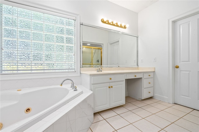 1421 Crossing Way, Auburn, AL 36830 - bathroom with vanity, tile patterned floors, and a whirlpool tub