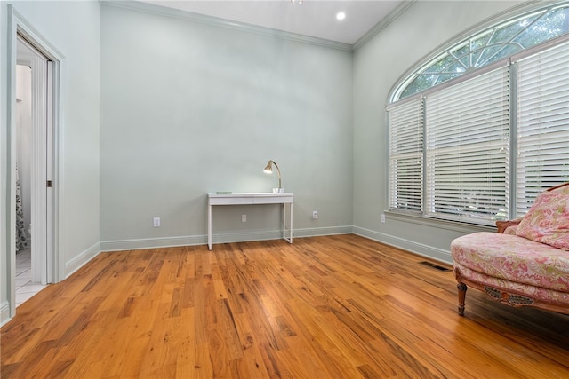 1421 Crossing Way, Auburn, AL 36830 - living area featuring crown molding, wood finished floors, and a high ceiling