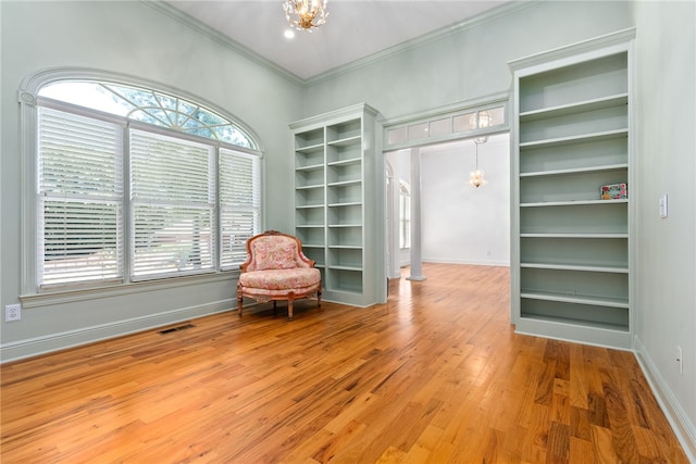 1421 Crossing Way, Auburn, AL 36830 - unfurnished room with a chandelier, crown molding, and wood finished floors