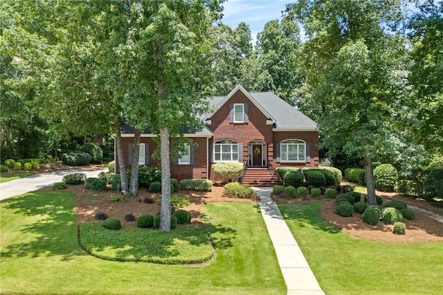 1421 Crossing Way, Auburn, AL 36830 - view of front of house with brick siding and a front yard