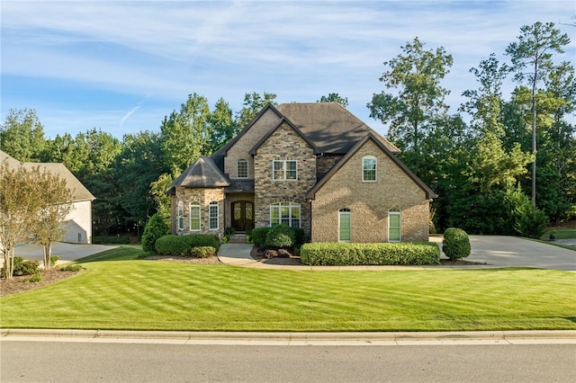 view of front of property with a front lawn