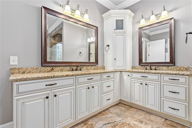 bathroom featuring vanity and ornamental molding