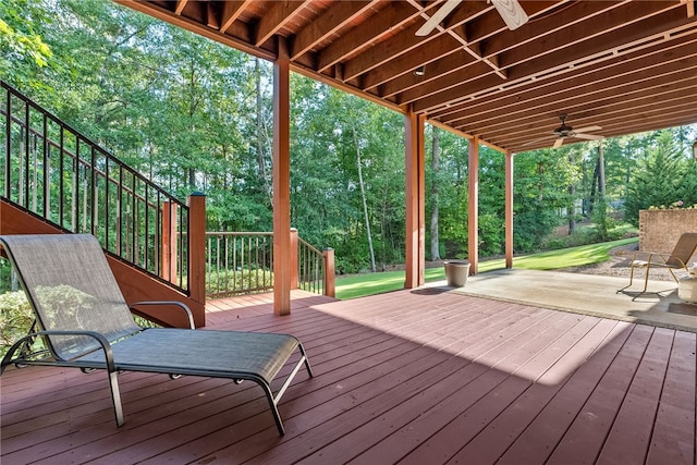 wooden terrace featuring ceiling fan