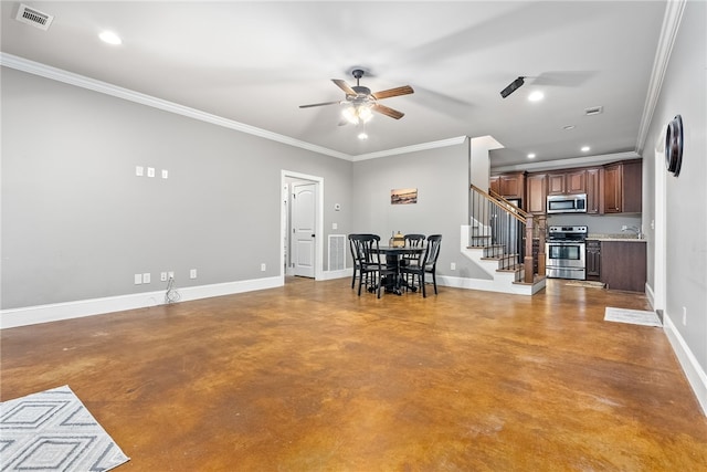 unfurnished dining area with ceiling fan, ornamental molding, sink, and concrete floors