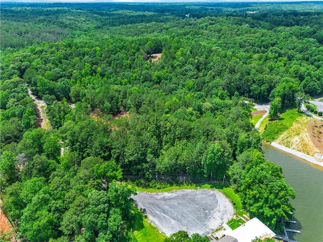 593 Elks Pkwy, Alexander City, AL 35010 - aerial view of property and surrounding area featuring a forest and a nearby body of water