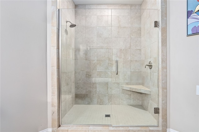 full bathroom with a stall shower