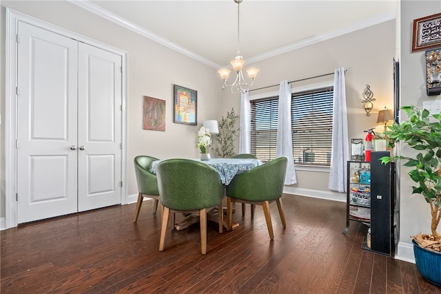 dining area with baseboards, a chandelier, dark wood finished floors, and crown molding