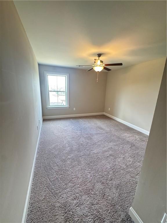 856 Violet Ln, Opelika, AL 36801 - carpeted empty room with ceiling fan and baseboards