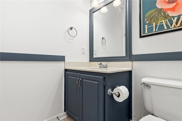 2092 S Evergreen Dr, Auburn, AL 36830 - half bath featuring a wainscoted wall, toilet, and vanity