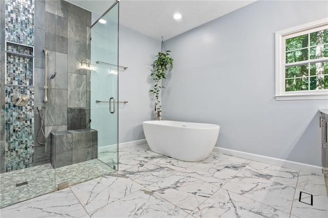 2092 S Evergreen Dr, Auburn, AL 36830 - bathroom featuring a shower stall, marble finish flooring, a soaking tub, vanity, and recessed lighting