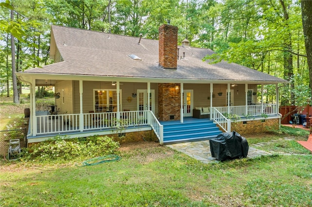 2092 S Evergreen Dr, Auburn, AL 36830 - back of property featuring a chimney, french doors, roof with shingles, and crawl space