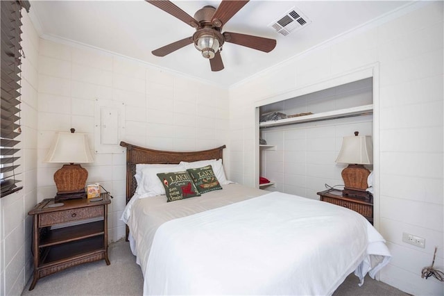 1701 Lee Road 353, Valley, AL 36854 - carpeted bedroom with crown molding, tile walls, and a ceiling fan