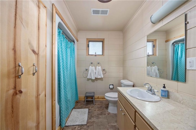 1701 Lee Road 353, Valley, AL 36854 - bathroom featuring crown molding, vanity, a shower with shower curtain, and tile walls