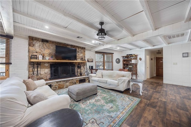 1701 Lee Road 353, Valley, AL 36854 - living area featuring wood-type flooring, beamed ceiling, and a stone fireplace